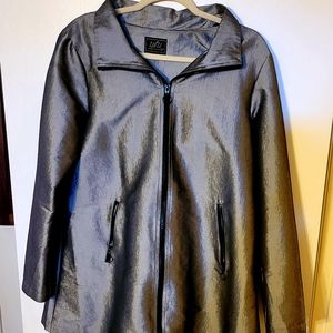 UBU rain jacket. Size S. Stunning silver metallic. Great condition.